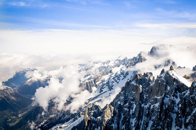 Scenic view of mountains against sky during winter