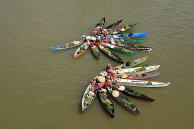 High angle view of people on boat in river