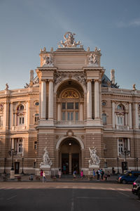 Facade of historic building against sky