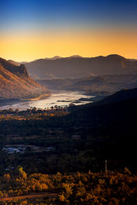 Scenic view of landscape against sky during sunset