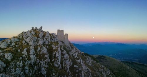 Scenic view of mountains at sunset