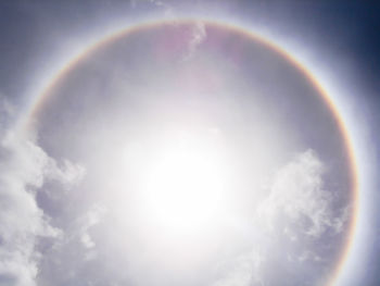 Low angle view of rainbow against sky