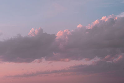 Low angle view of dramatic sky during sunset