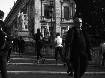 People walking on city street