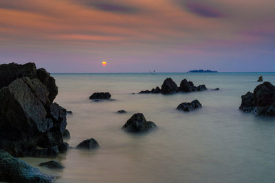 Scenic view of sea against sky during sunset