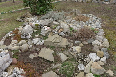 High angle view of stones on field