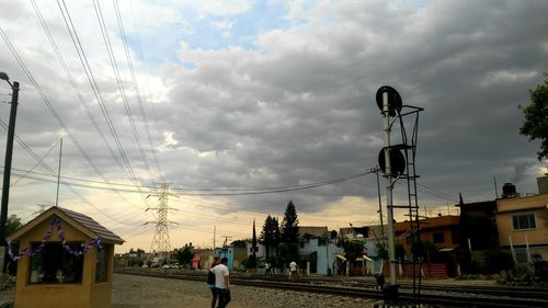 Panoramic view of power lines against sky