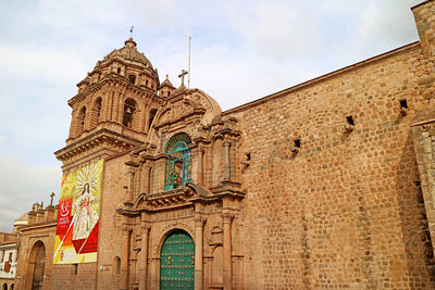 Amazing church's main facade of the convent of la merced with a baroque bell tower