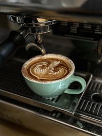 Close-up of coffee on espresso machine 