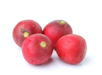 Close-up of apples on white background