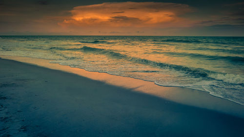 Scenic view of sea against sky during sunset