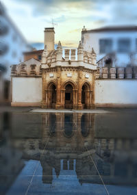 Digital composite image of building against sky