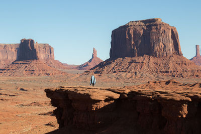 Scenic view of rocks against clear sky