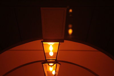 Low angle view of illuminated ceiling