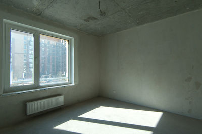 Interior of empty room with windows