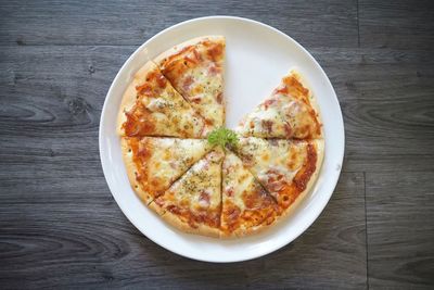 High angle view of pizza on table