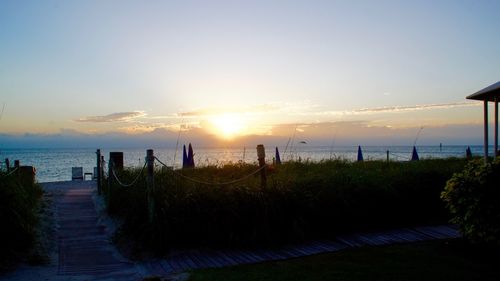 Scenic view of sea at sunset