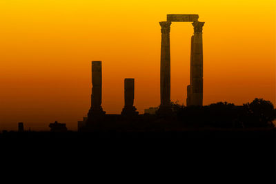 Silhouette old ruin against clear sky at sunset