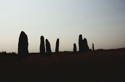 Silhouette landscape against clear sky