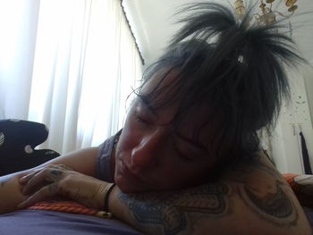 Portrait of woman relaxing at home