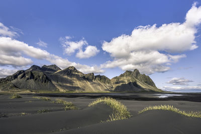 Panoramic view of landscape and mountains against sky