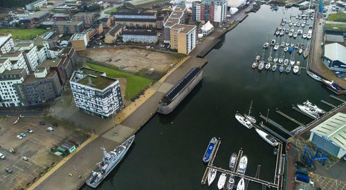 High angle view of river amidst buildings in city