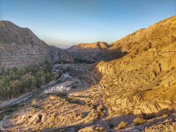 Scenic view of desert against clear sky