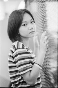 Portrait of young woman looking away