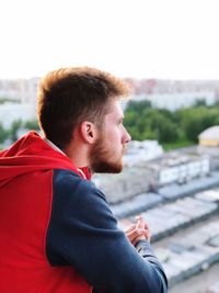 Close-up of young man looking away