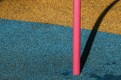 High angle view of multi colored shadow on floor