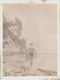 Man standing on sand