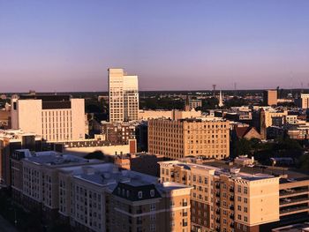 Cityscape against clear sky