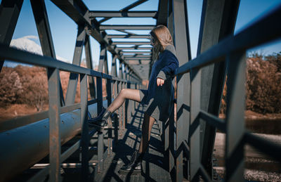 Woman on bridge