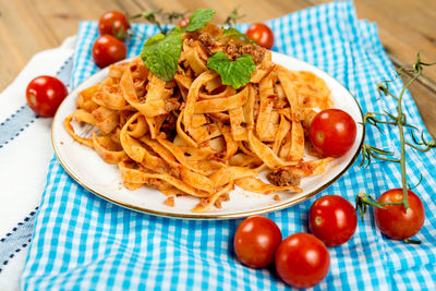 High angle view of tagliatelle pasta served in dish