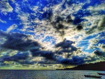 Scenic view of sea against dramatic sky