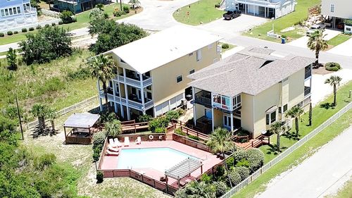 High angle view of buildings and trees in city