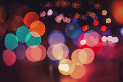 Defocused image of illuminated lights at night