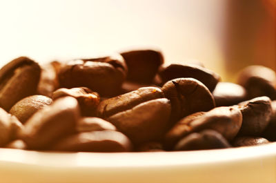 Close-up of roasted coffee beans in bowl