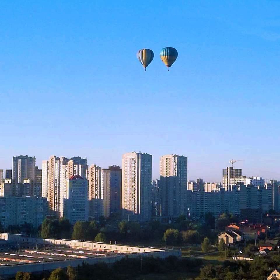 SKYSCRAPERS IN CITY AGAINST CLEAR SKY