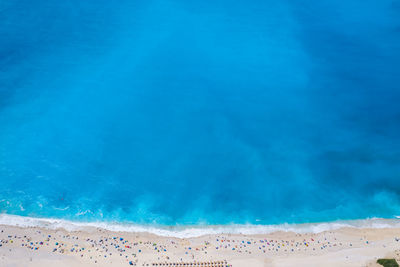 Scenic view of sea against blue sky