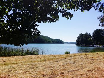 Scenic view of lake against clear sky