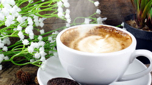 Close-up of cappuccino on table