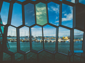 View of sea through window