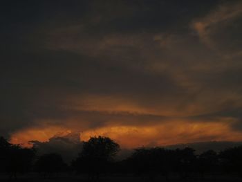 Low angle view of cloudy sky at sunset