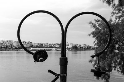 Panoramic view of river in city against sky