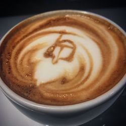 Close-up of cappuccino on table