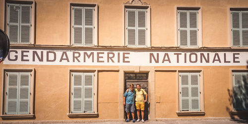 People standing outside building