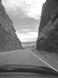 Road seen through car windshield