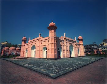 View of historic building against blue sky