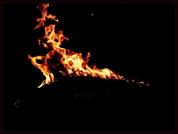 View of bonfire at night